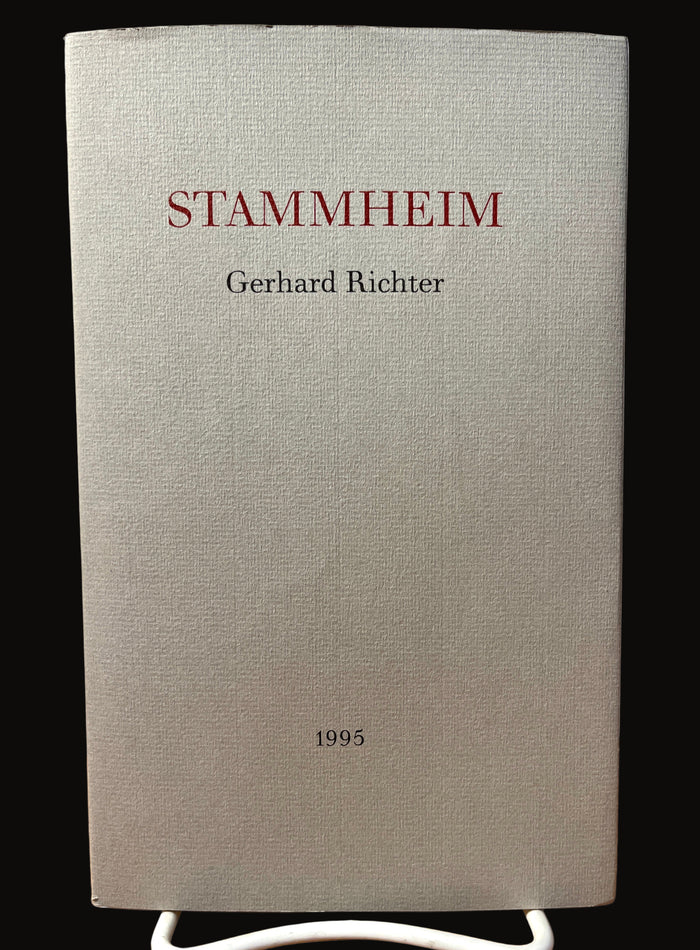 The image shows the cover of an artist book titled 'Stammheim' by Gerhard Richter, published by Anthony d'Offay Gallery in 1995. The cover is in a neutral gray tone with red and black text, featuring the title and the artist's name.