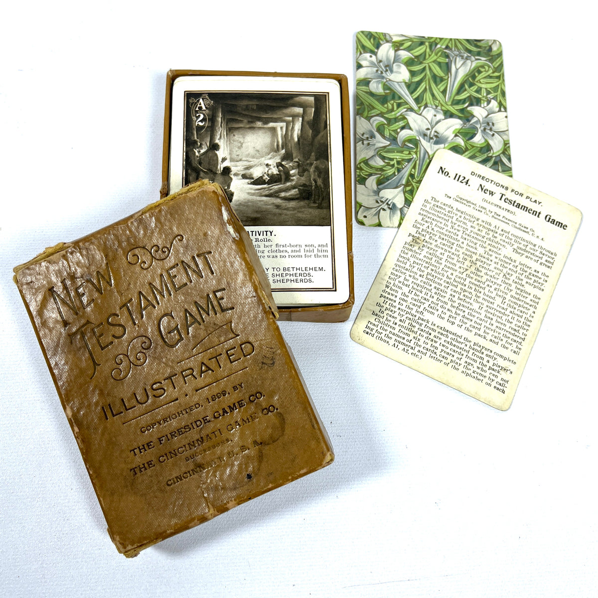New Testament Game, Illustrated, The Fireside Game Co., 1899, Good hardcover cased deck of cards.